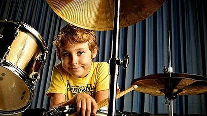 little-boy-playing-drum