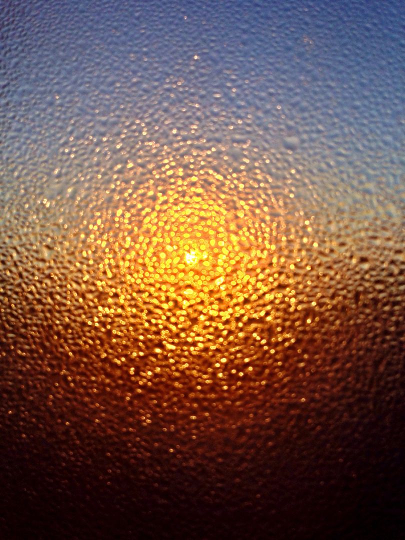 sunrise through frosted window