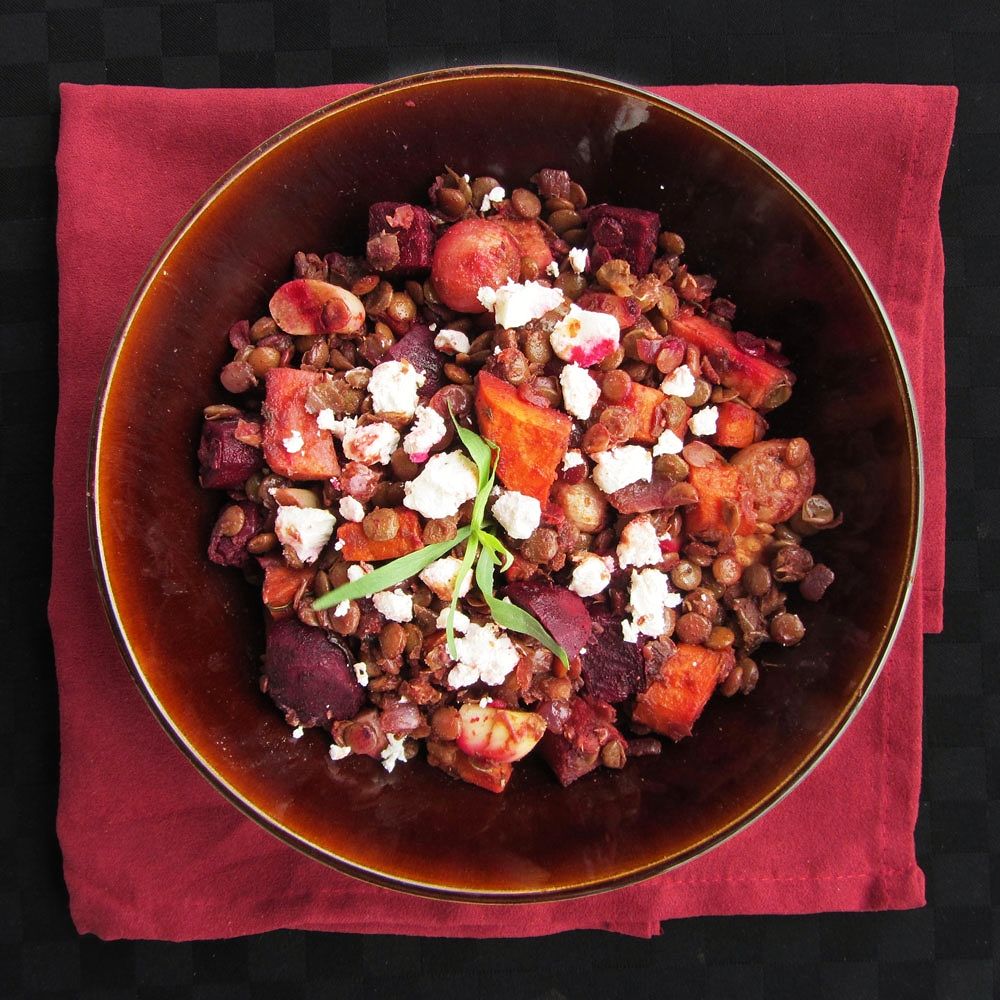 Red wine lentils with roasted vegetables and goat cheese