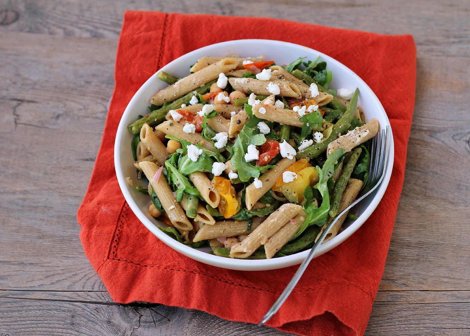 Arugula Pasta Salad with Goat Cheese, Olives, Chickpeas, and Roasted Veggies