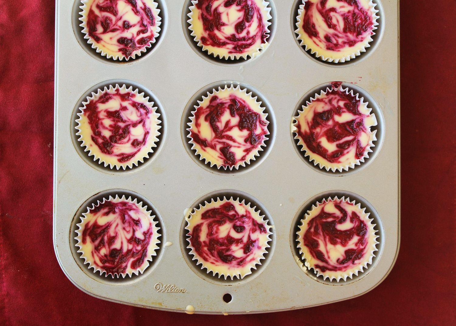 cherry swirl cheesecakes