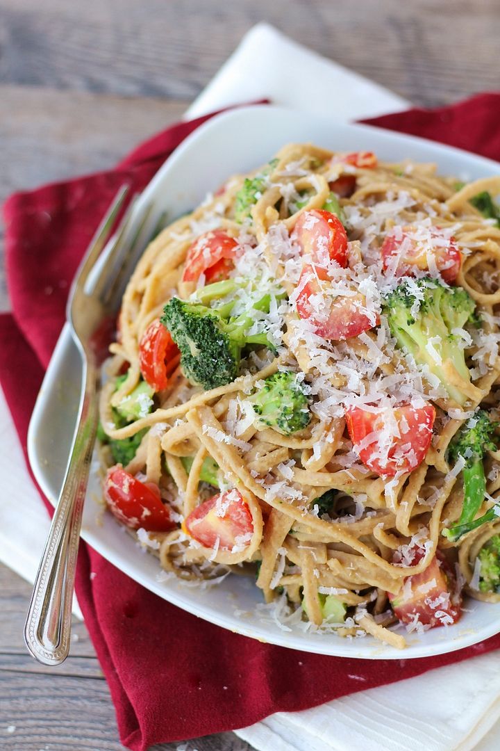 Healthy vegetarian whole wheat pasta with broccoli, tomatoes, and chickpea sauce!