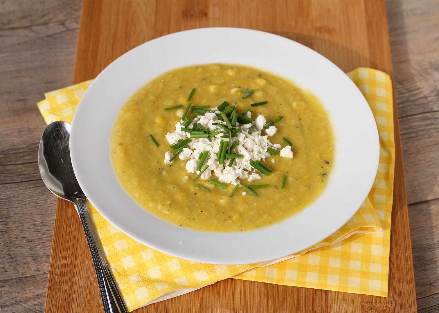 Golden Summer Squash and Corn Soup, topped with Feta & Chives