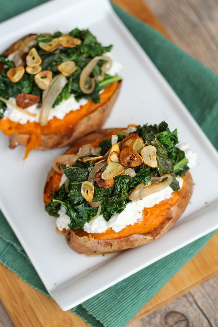 Baked Sweet Potatoes Topped with Ricotta, Goat Cheese, Kale, and Garlic Chips